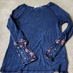 Intentional Distress Blue Top with Floral Accents